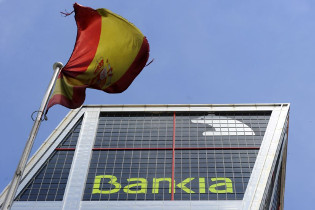 Европейская программа помощи испанским банкам успешно завершена